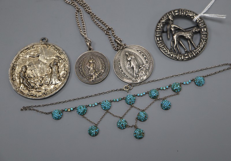 A white metal and turquoise bead set drop necklace (beads missing) and four other items including medallions.